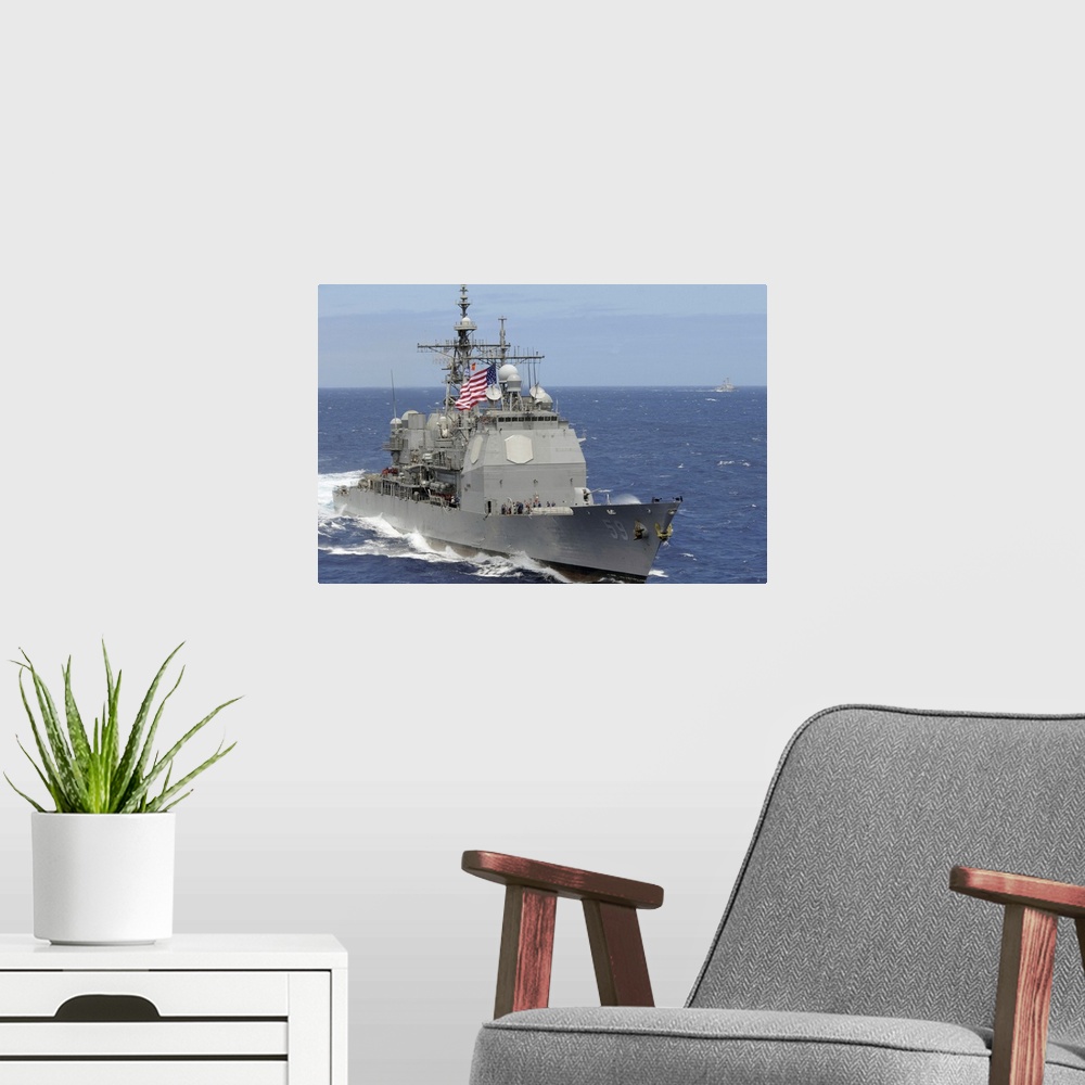 A modern room featuring Pacific Ocean, July 18, 2012 - The guided-missile cruiser USS Princeton is underway during the Gr...