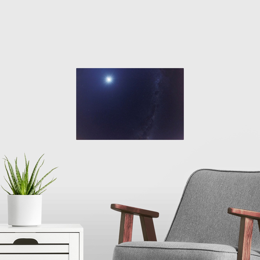 A modern room featuring The Moon and the Milky Way in an ultra widefield of view.