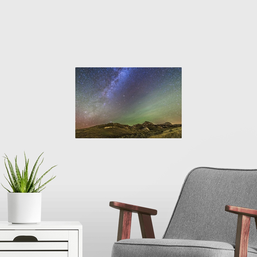 A modern room featuring The northern autumn stars and constellations rising in the east over the Badlands of Dinosaur Pro...