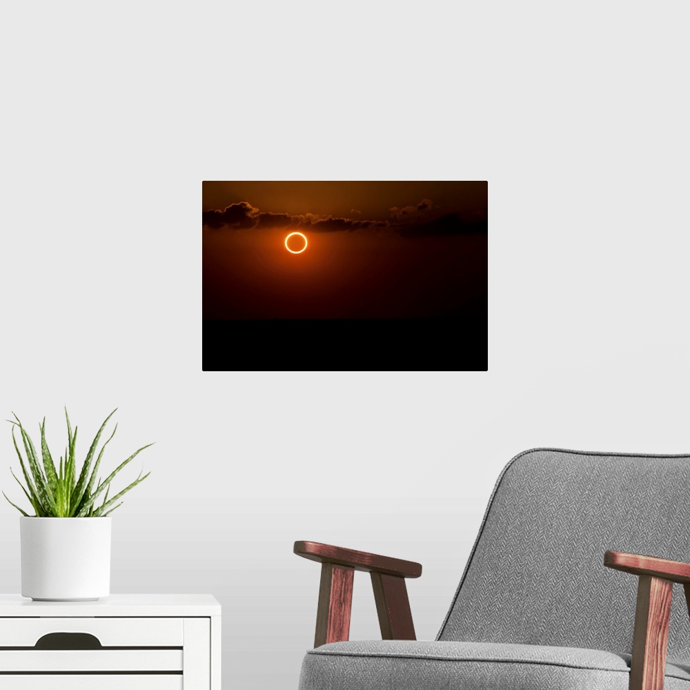 A modern room featuring Totality during annular solar eclipse with ring of fire.