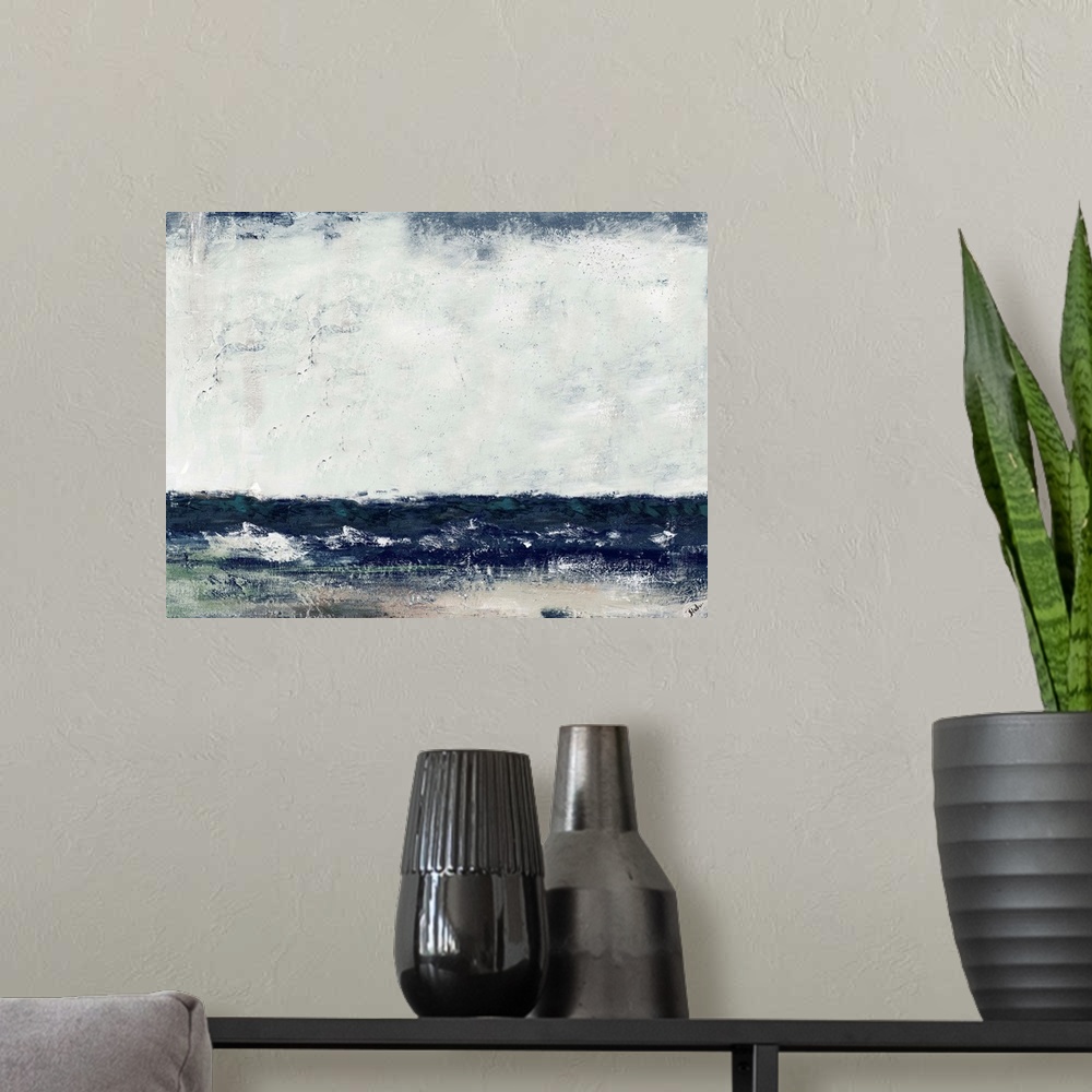 A modern room featuring A contemporary abstract painting of the ocean at Cape Cod with dark blues and an overcast sky.