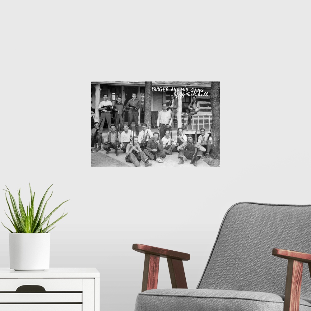 A modern room featuring A portrait on a postcard of 'Birger and His Boys,' an American gang lead by Charlie Birger that o...