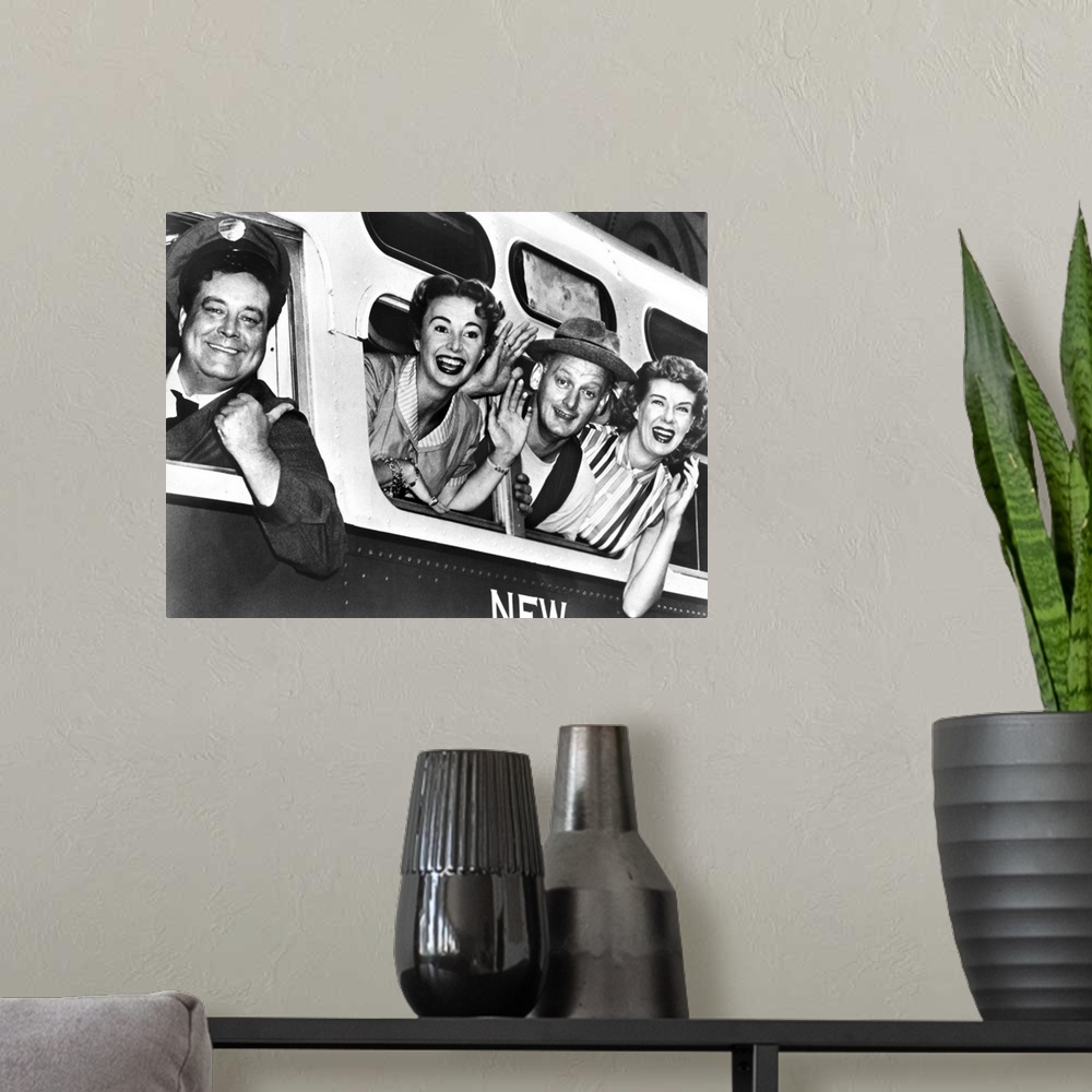 A modern room featuring Left to right: Cast members Jackie Gleason, Audrey Meadows, Art Carney, and Joyce Randolph in a p...