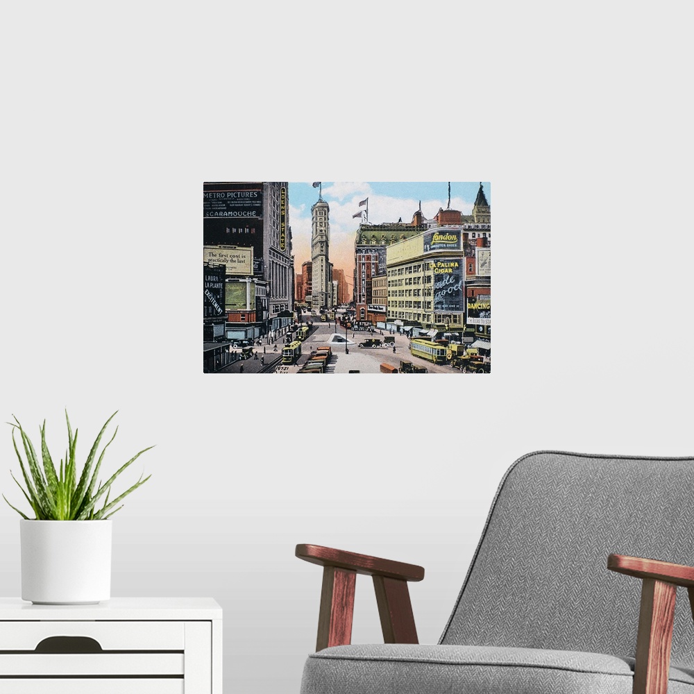 A modern room featuring Times Square in New York City looking south towards the New York Times building at 42nd Street. A...