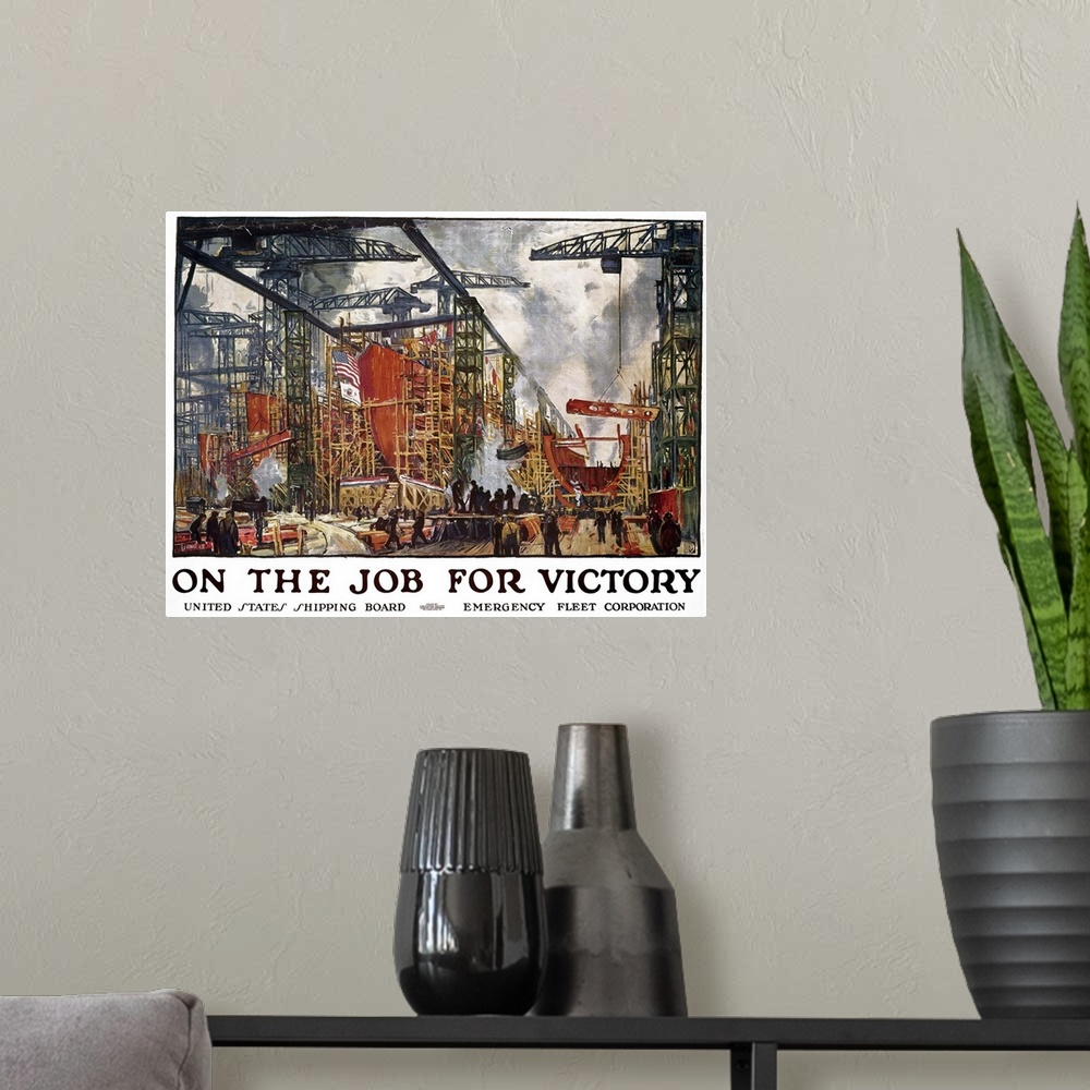 A modern room featuring On the job for victory. American World War I United States Shipping Board poster.