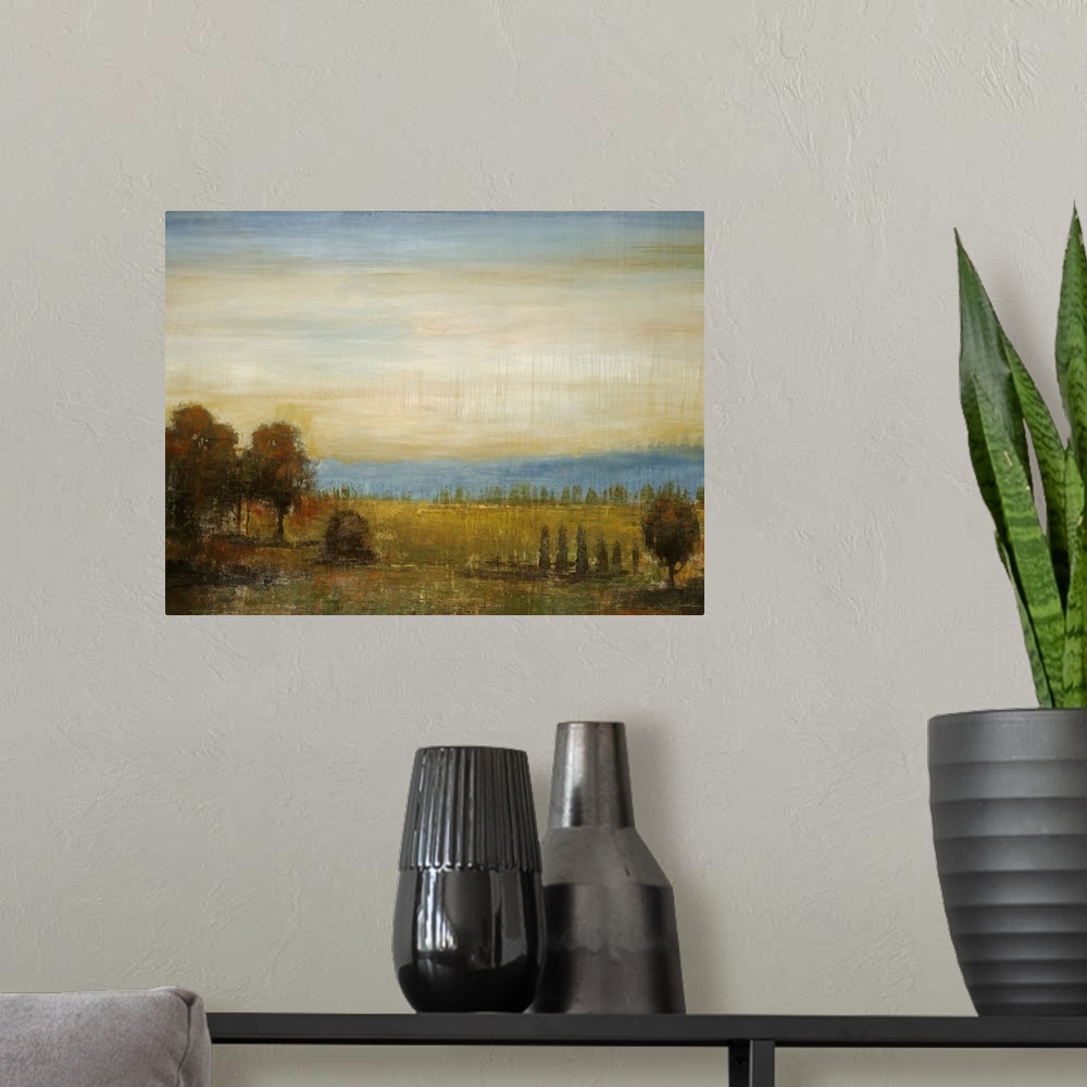 A modern room featuring Painting on canvas of a field with a bunch of trees and a rolling hill in the distance.