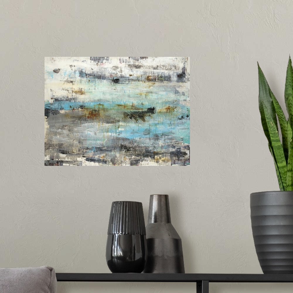 A modern room featuring Abstract painting with textured hues in shades of blue, gray, orange, and cream.