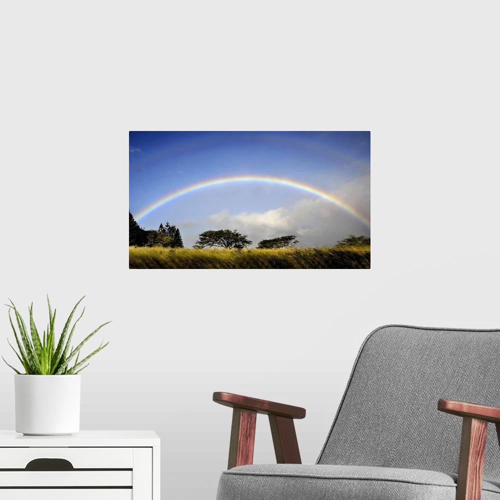 A modern room featuring A double rainbow above countryside