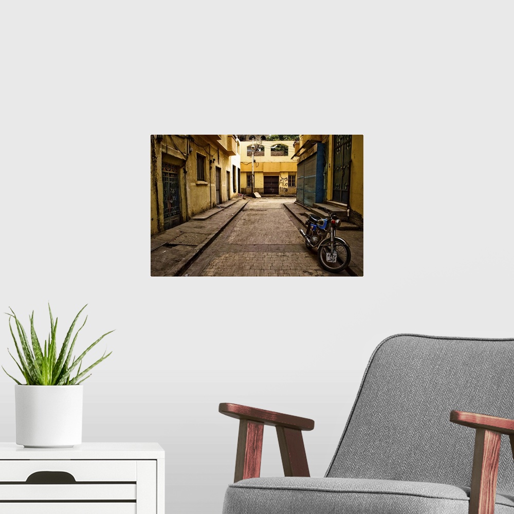 A modern room featuring Back street of Luxor Town, Egypt with motorbike