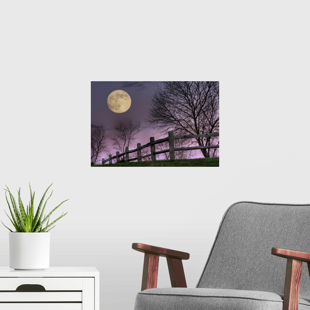 A modern room featuring November Moon rising over hill at Inn at Cedar Falls in Hocking Hills