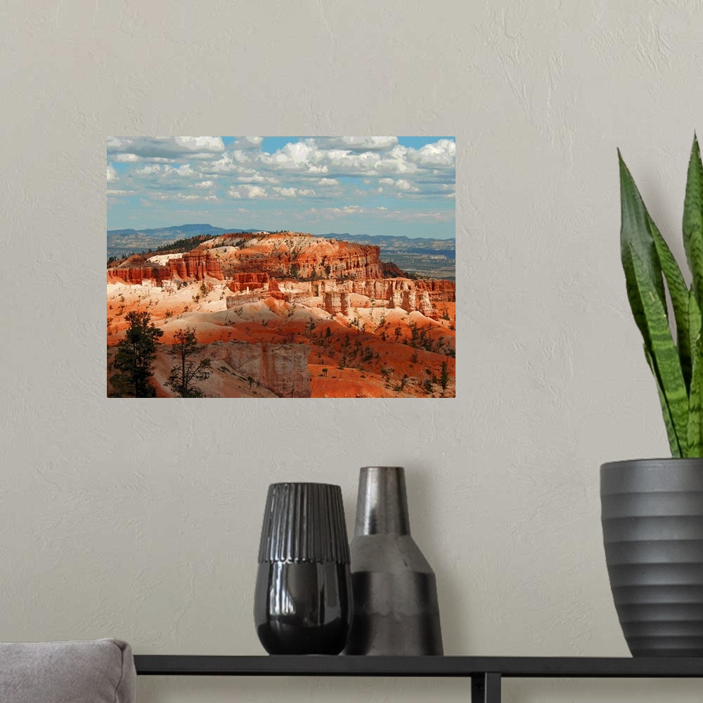 A modern room featuring Posterized landscape in USA with red rocks.