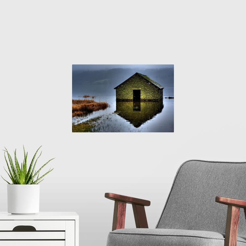 A modern room featuring An old flooded boat house on Lake Windermere
