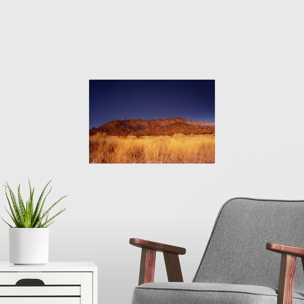 A modern room featuring travel destinations: the sandia mountains desert twilight landscape glows, albuquerque, new mexico