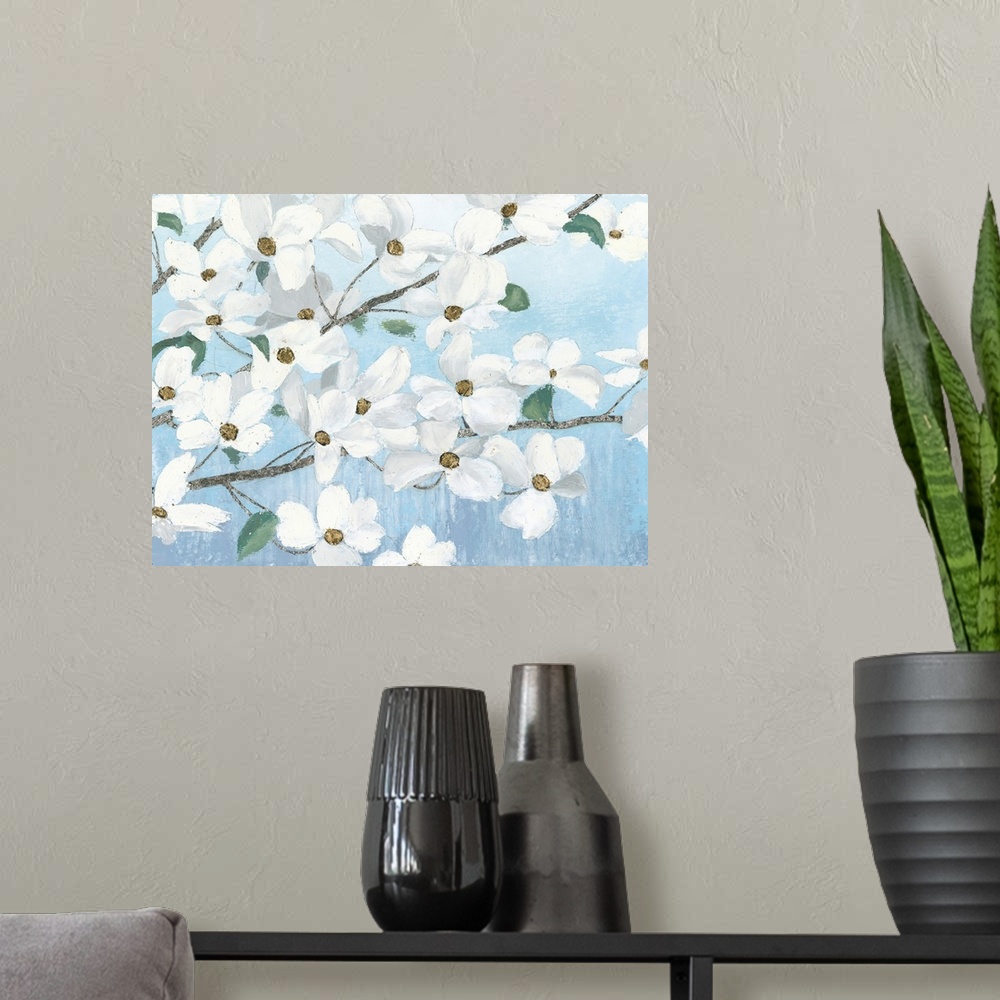A modern room featuring Contemporary painting of dogwood flowers with a light blue background.