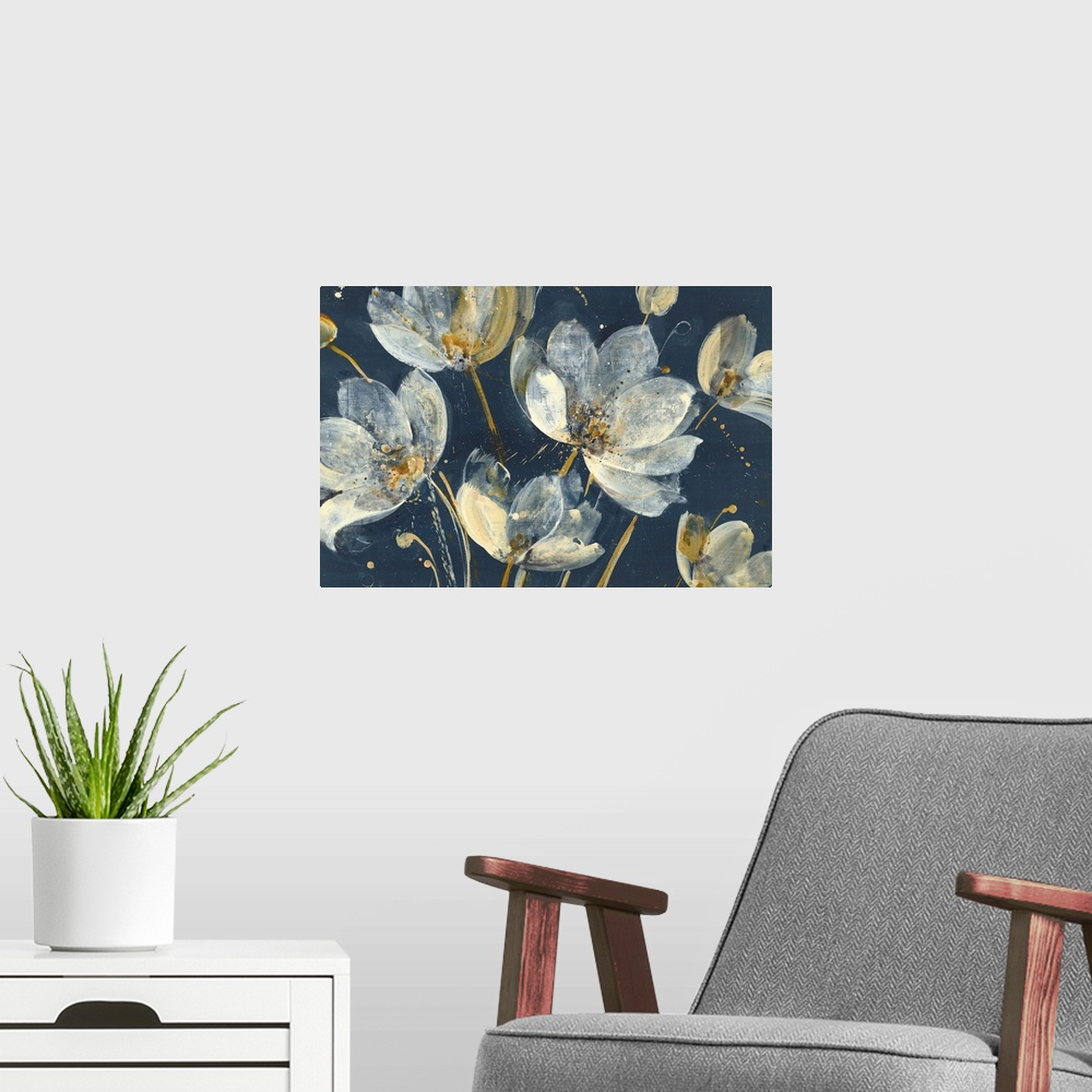 A modern room featuring Large abstract painting of white and gold flowers on a dark blue background.