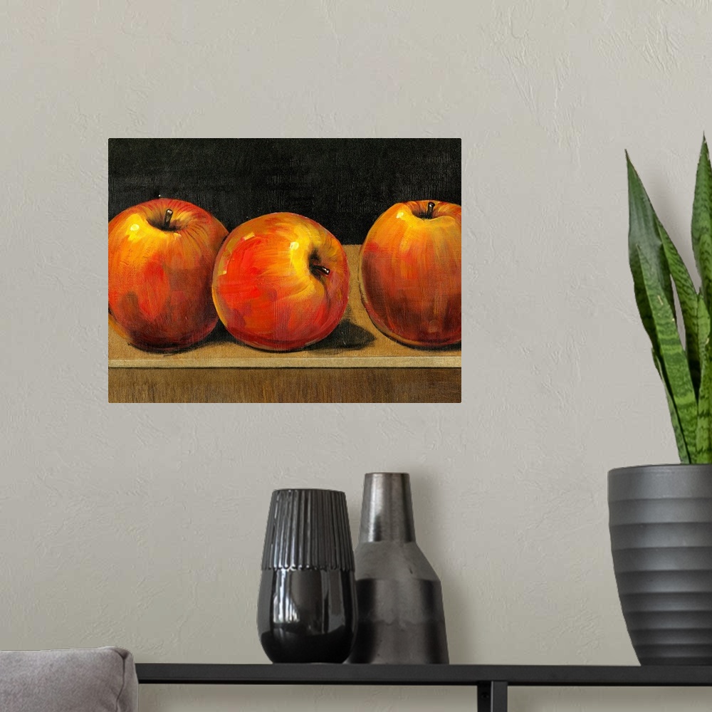 A modern room featuring Big still life painting of three apples sitting on a desk on canvas.