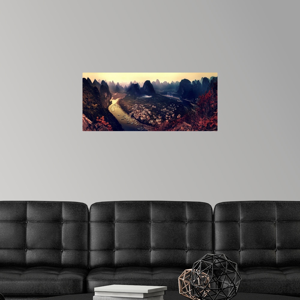 A modern room featuring A dynamic and intense photograph of a view of the Karst mountains in Guangxi, China.