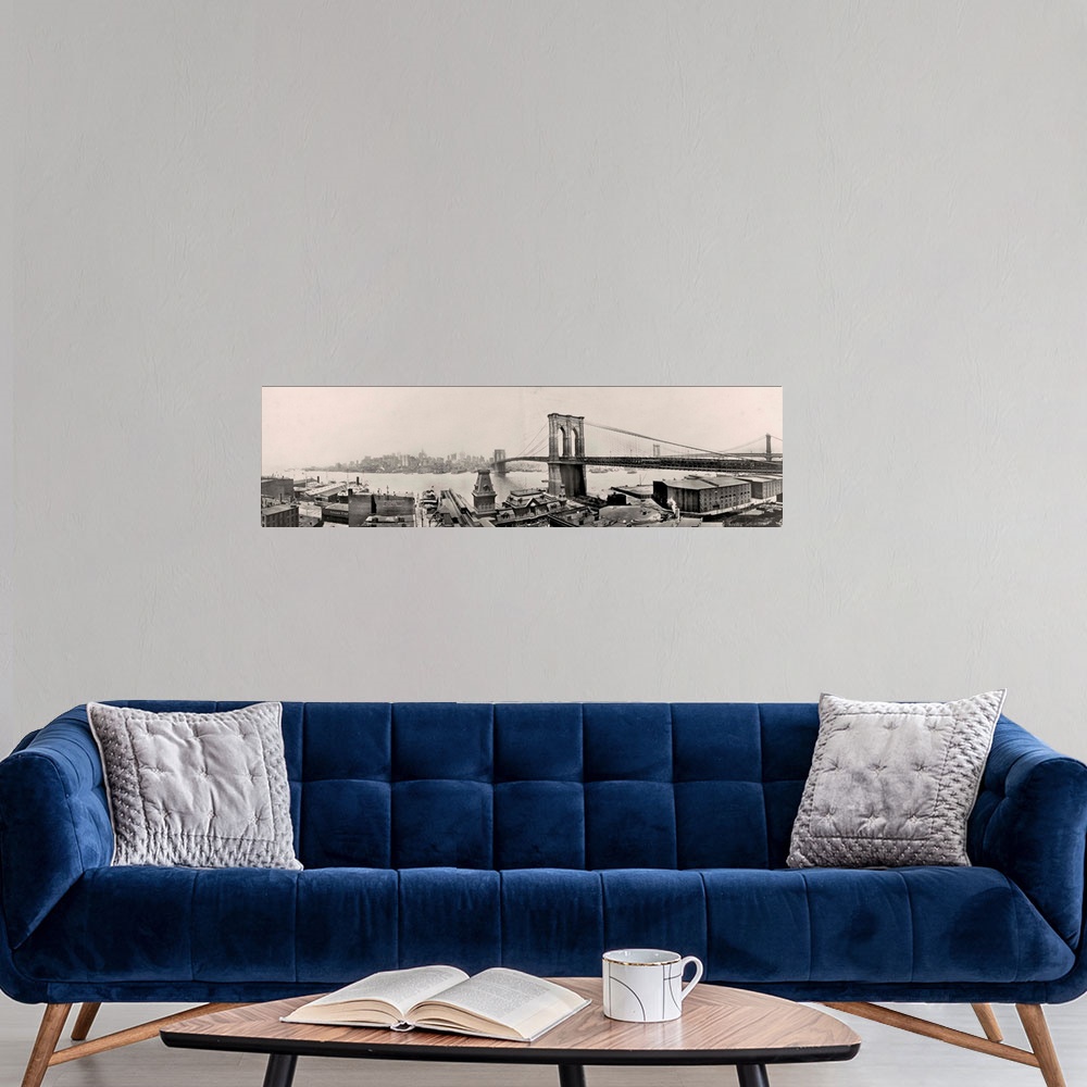 A modern room featuring Vintage photograph of the Brooklyn Bridge in New York City.