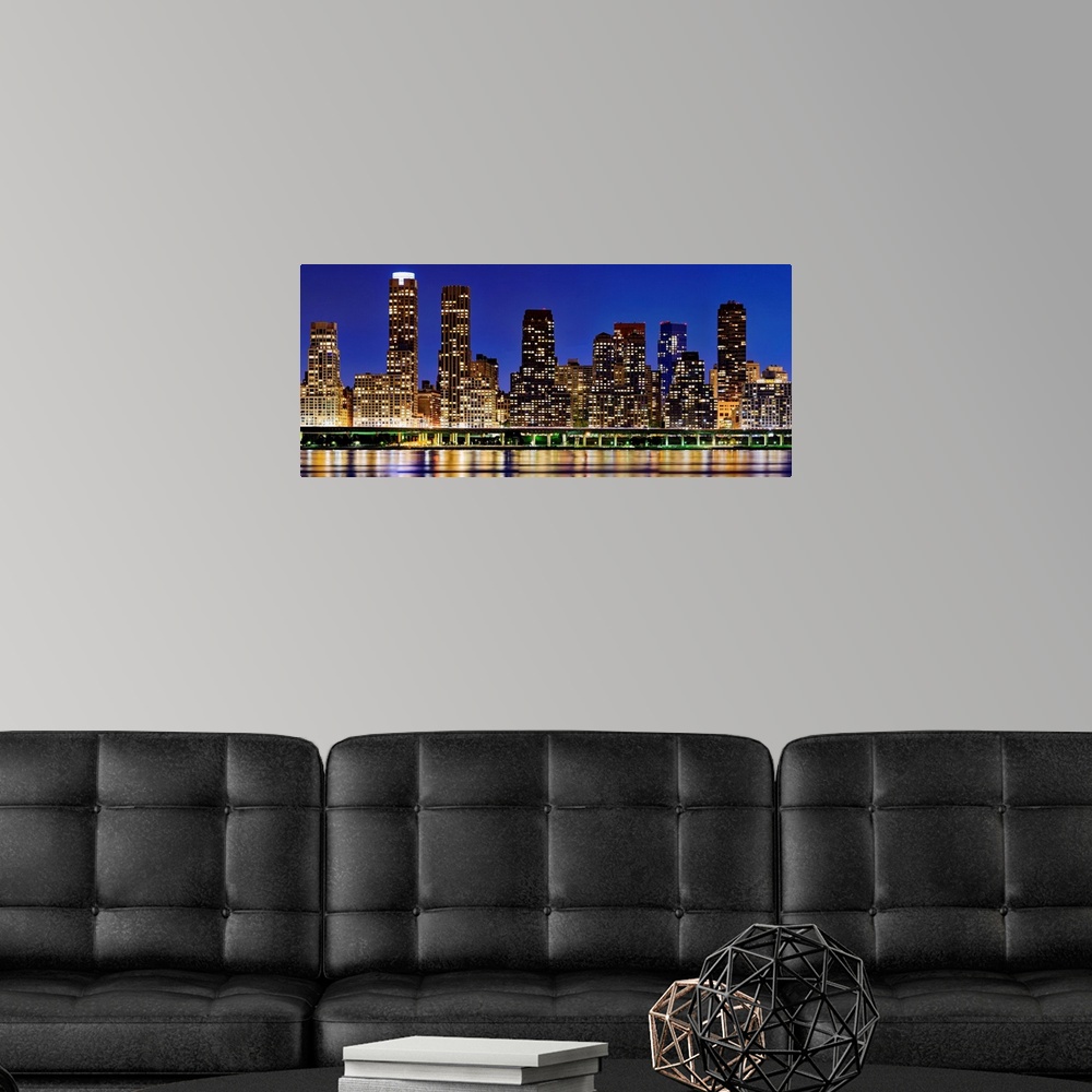 A modern room featuring Panoramic View Of Uptown Skyscrapers