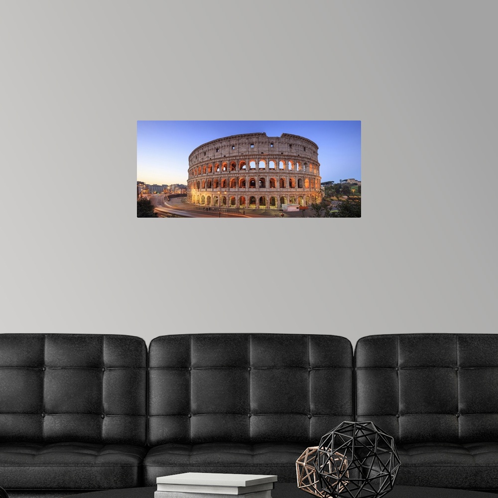 A modern room featuring Italy, Rome, Colosseum and Roman Forum by night