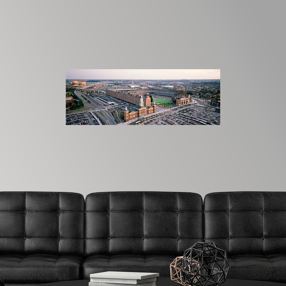 A modern room featuring Wide angle aerial picture taken of Baltimore Maryland and the Orioles stadium.