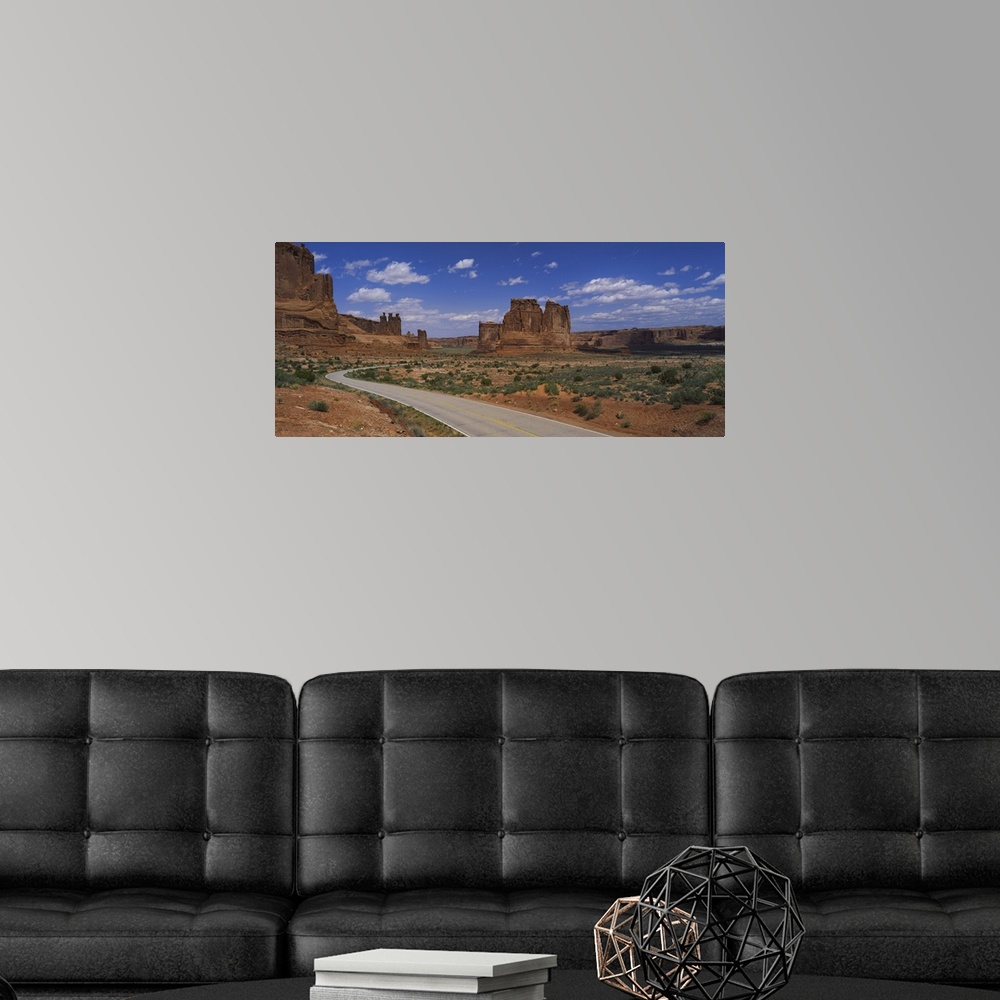 A modern room featuring Empty road running through a national park, Arches National Park, Utah