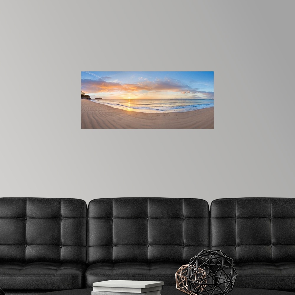 A modern room featuring Sunrise over the sea, Tenby, Pembrokeshire, Wales