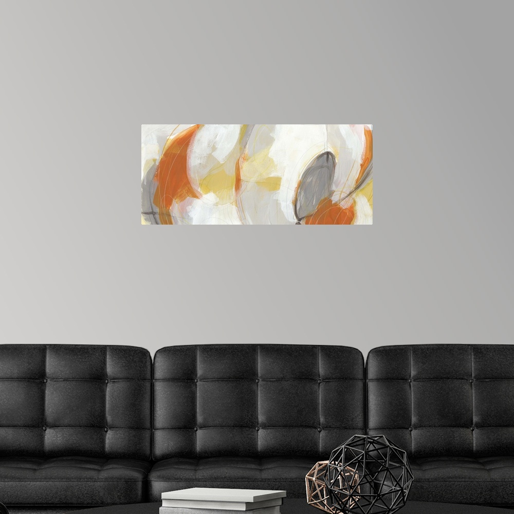 A modern room featuring Abstract artwork in large oval shapes in orange, yellow and white.