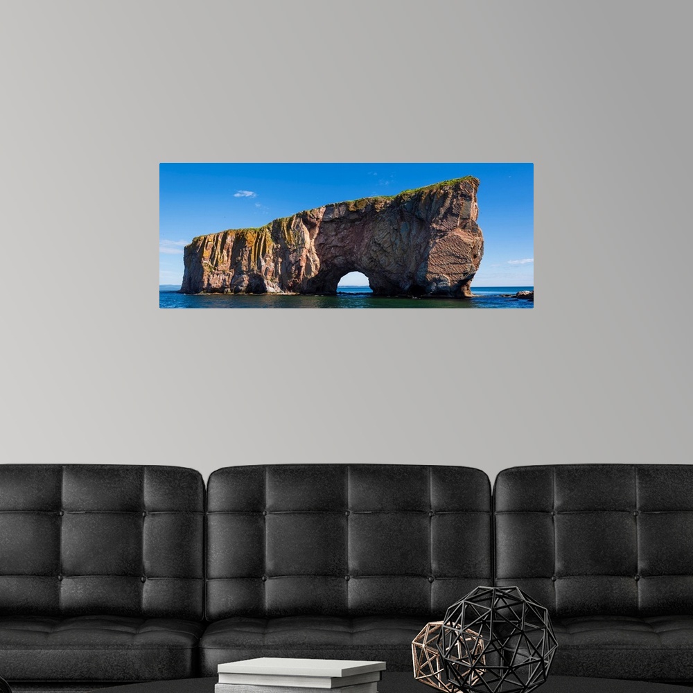 A modern room featuring Perce Rock in the Gulf of Saint Lawrence, Bonaventure Island and Perce Rock National Park, Perce,...