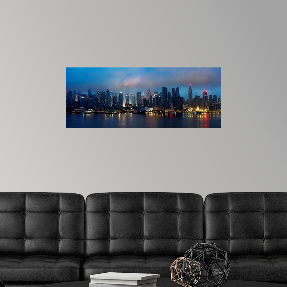 A modern room featuring Manhattan Panoramic View At Sunset