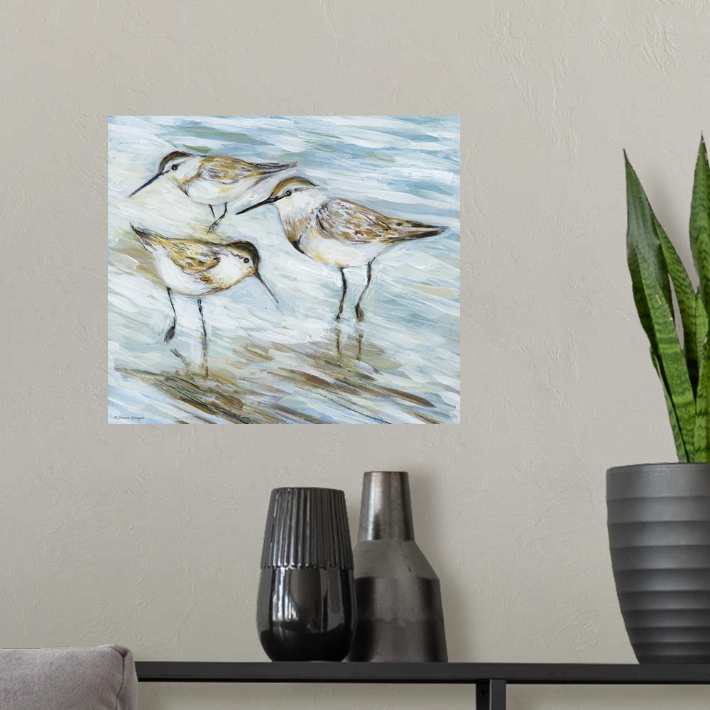 A modern room featuring Charming sandpipers enjoy having their seaside setting.