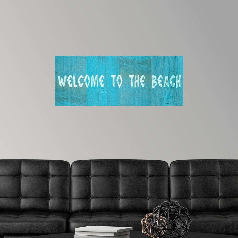 A modern room featuring Welcome to the Beach