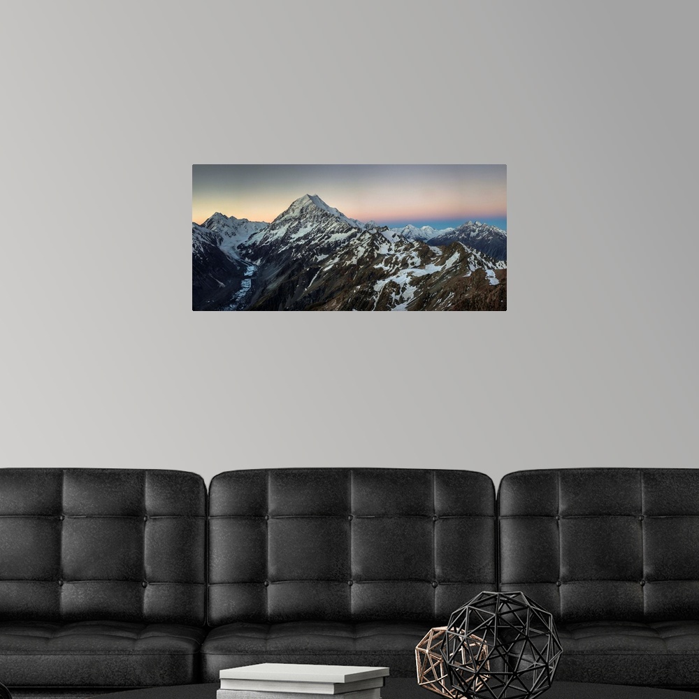 A modern room featuring Alpenglow, panorama LtoR: Mounts La Perouse, Aoraki Mount Cook, Tasman glacier, Malte Brun Range,...