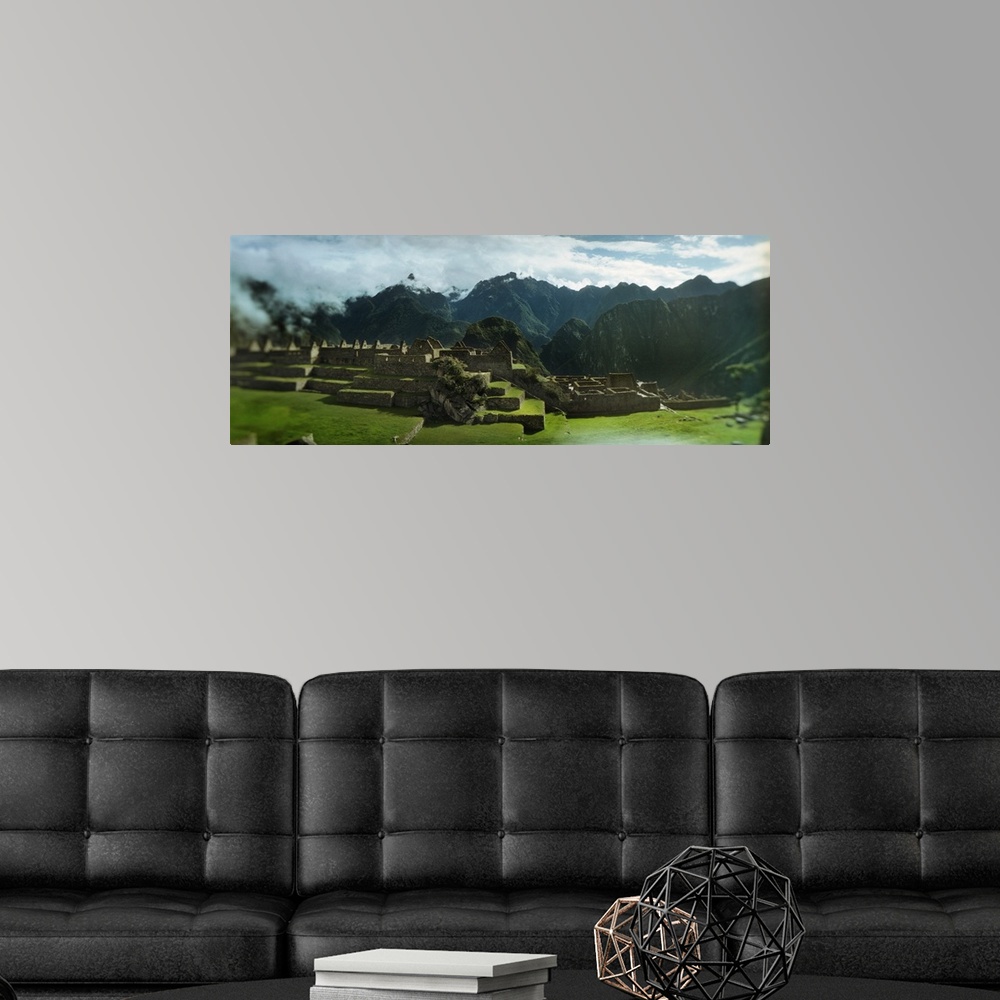 A modern room featuring Ruins of buildings at an archaeological site Inca Ruins Machu Picchu Cusco Region Peru