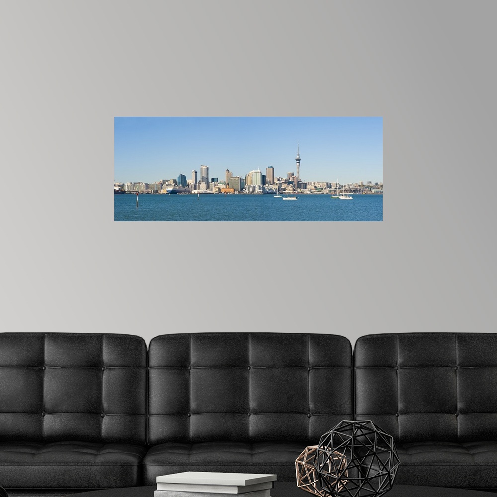A modern room featuring Panorama of the Auckland city skyline, Auckland, North Island, New Zealand, Pacific
