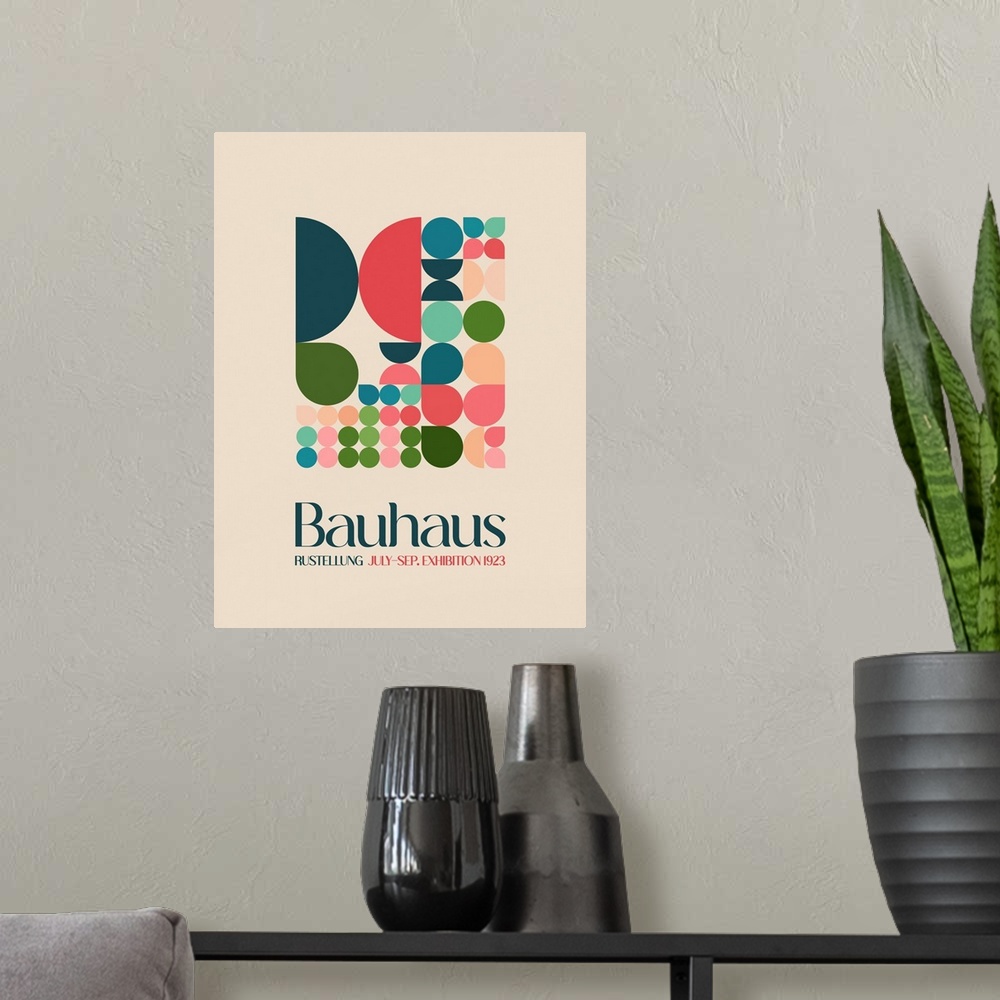 A modern room featuring A mid-century style poster advertising Bauhaus