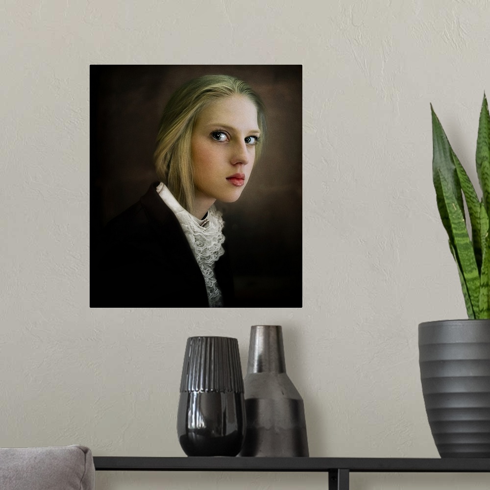 A modern room featuring Portrait of a young blonde woman with large eyes and a lace blouse.