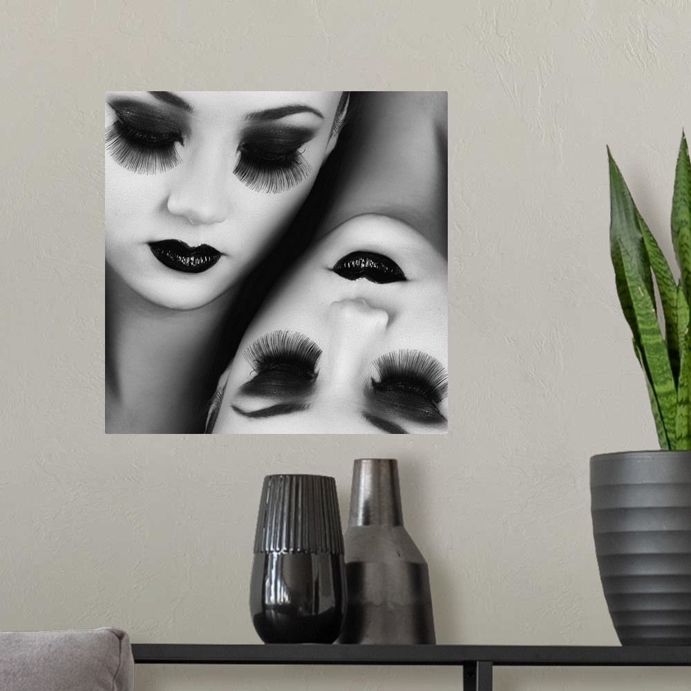 A modern room featuring Conceptual image of the heads of two women side by side, each with long eyelashes and dark lipstick.