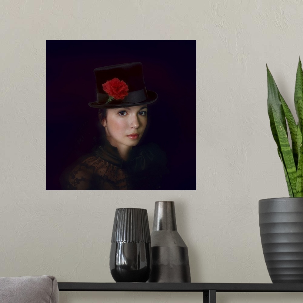 A modern room featuring Portrait of a lovely young woman wearing a top hat decorated with a red carnation.
