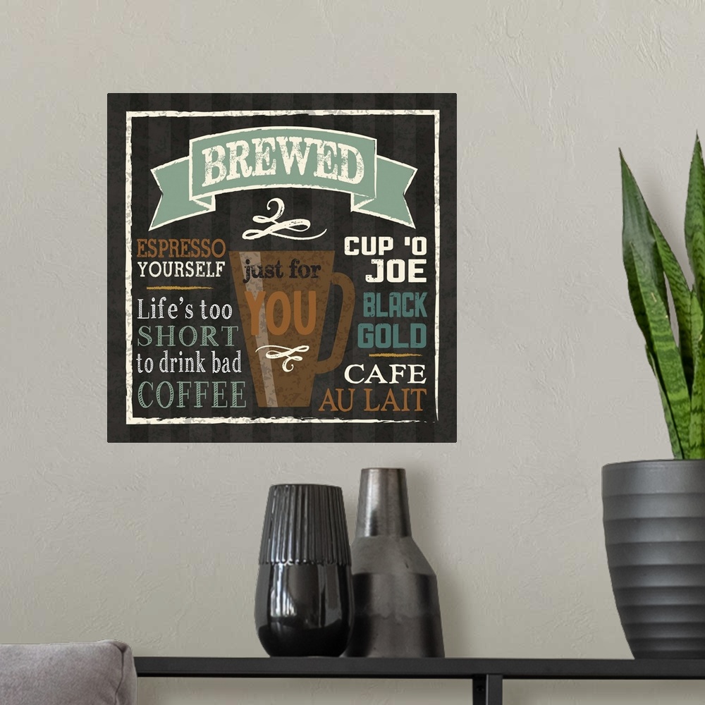 A modern room featuring Chalkboard style artwork featuring a  mug of coffee and coffee-related phrases.