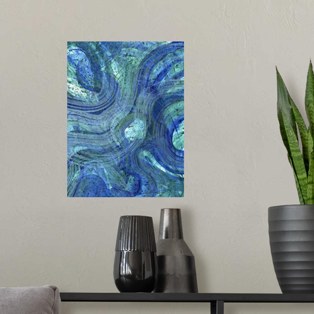 A modern room featuring Contemporary abstract artwork resembling waves in deep blue water.