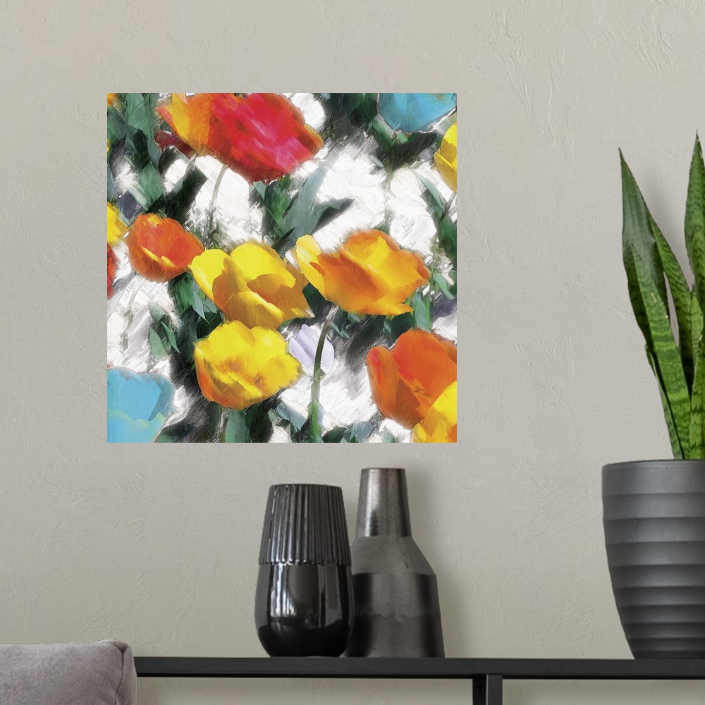 A modern room featuring A bright and colorful abstract painting of yellow, orange, red, and blue flowers on a white backg...