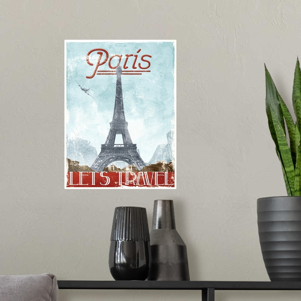 A modern room featuring Home decor artwork of a travel poster for France in a vintage style.