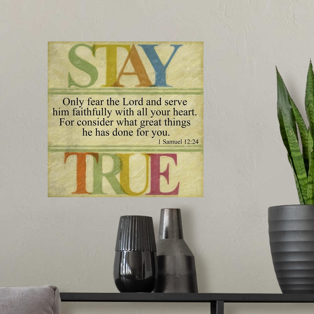 A modern room featuring Bible verse I Samuel 12:24 framed by letters in rainbow colors.