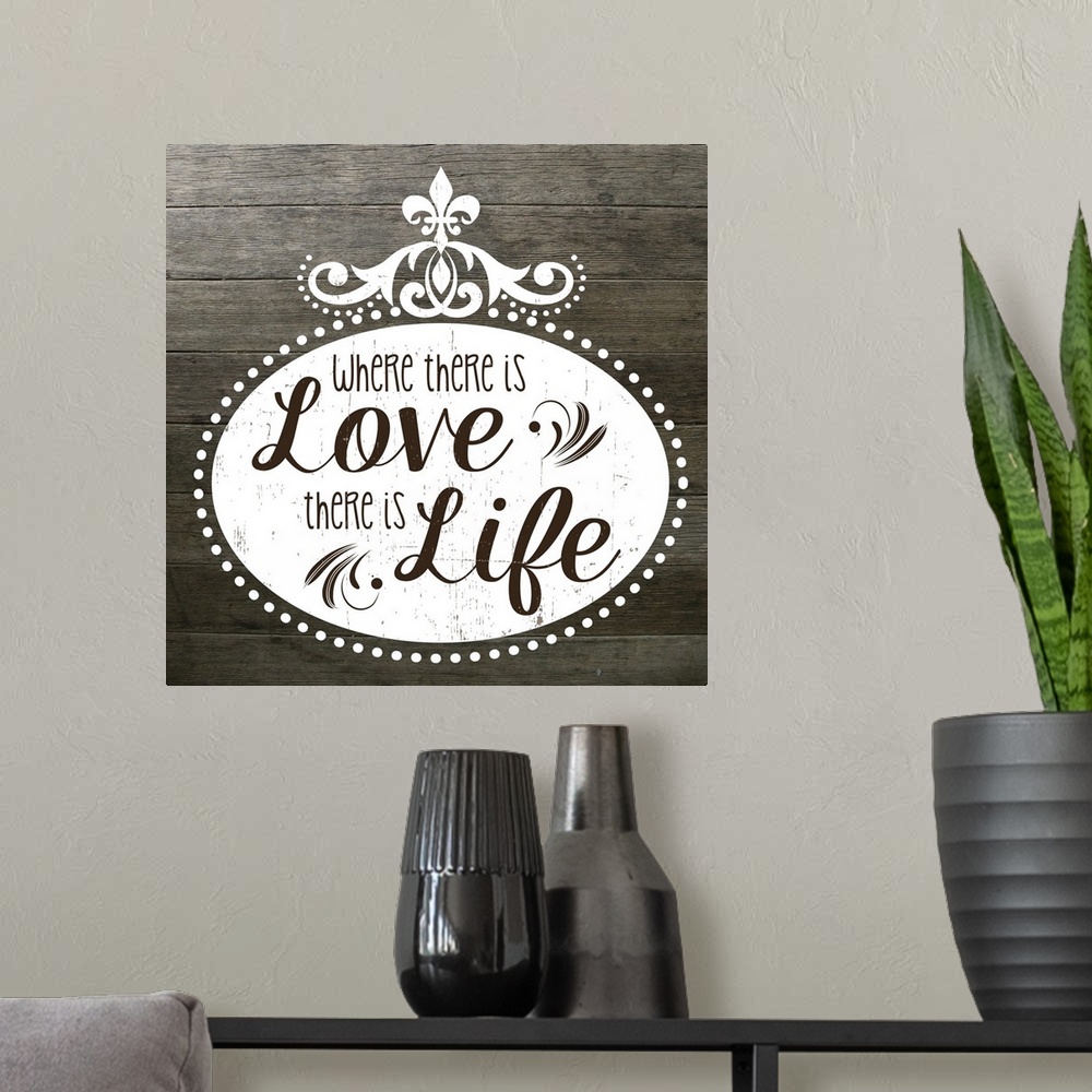 A modern room featuring The phrase "Where there is love there is life" on a vintage marquee shape over a faux wood texture.