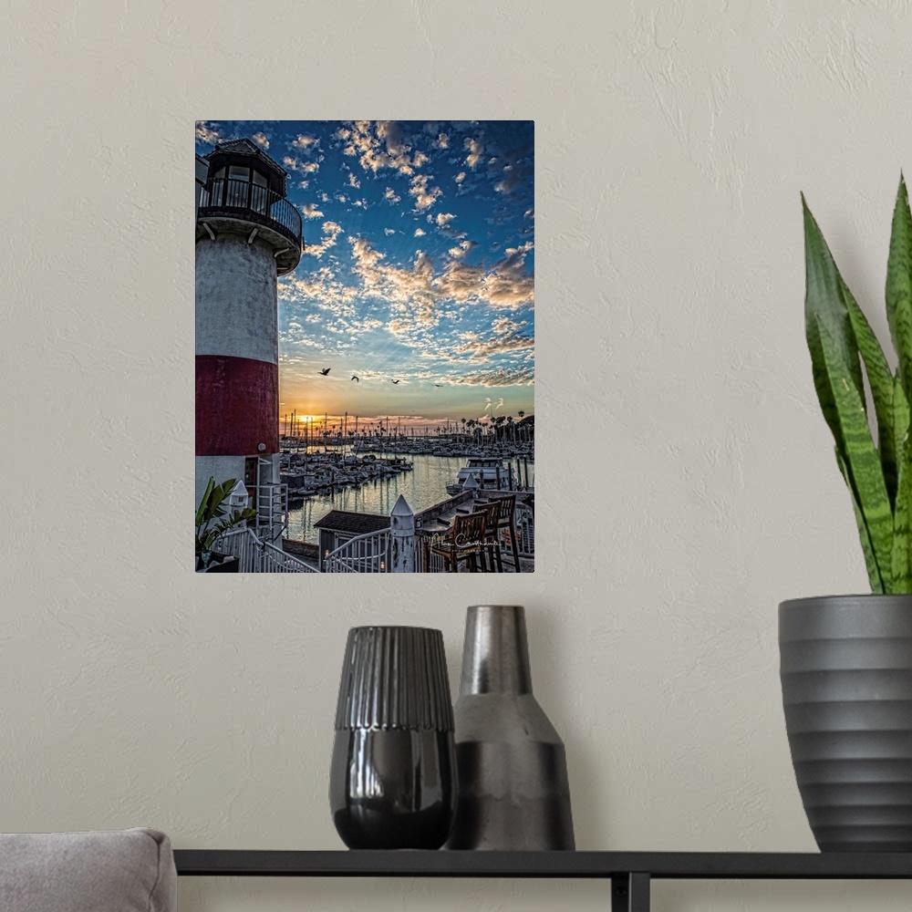 A modern room featuring Oceanside Lighthouse at sunset. Oceanside, California, USA