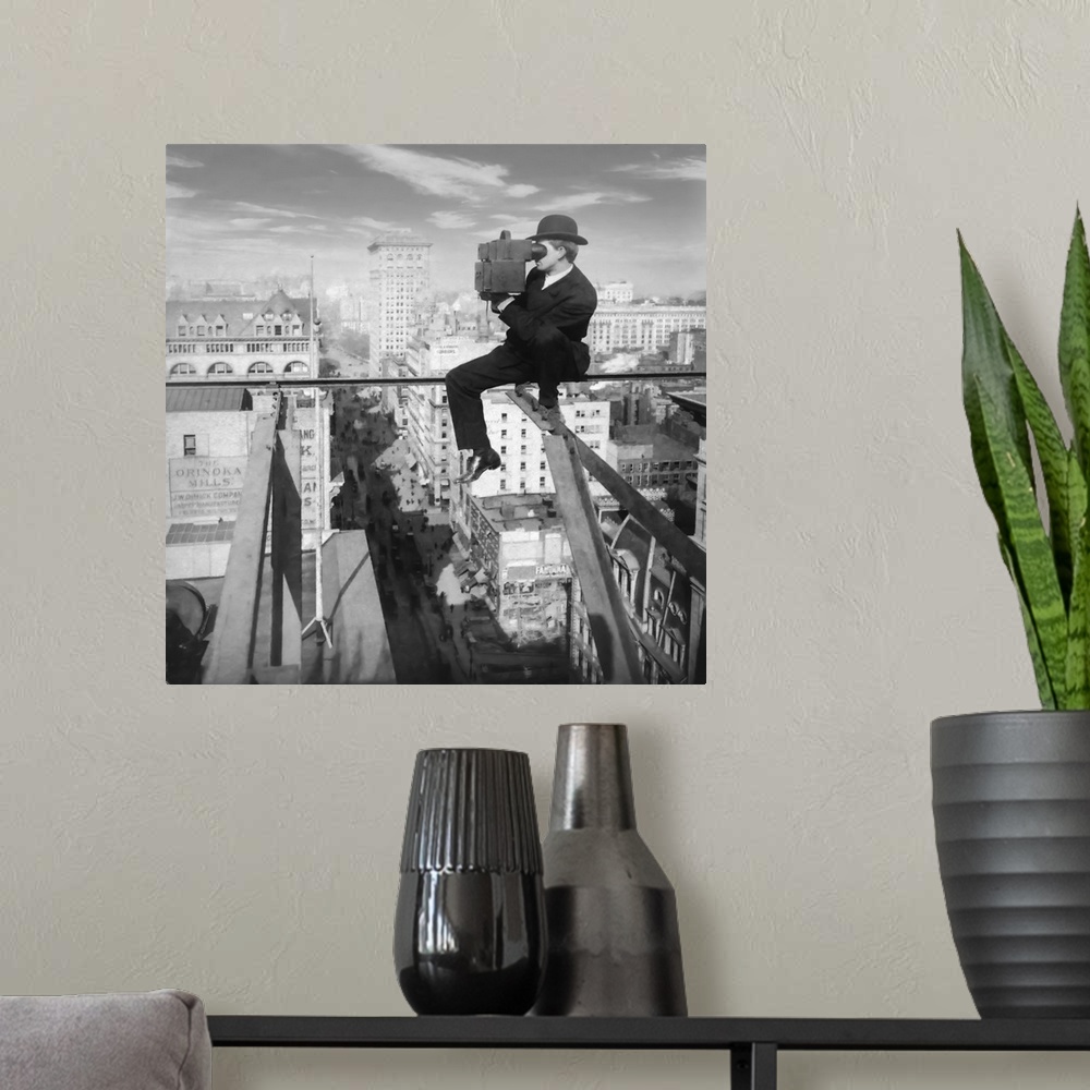 A modern room featuring Historic image in black and white of a photographer sitting on a slender girder above fifth avenu...
