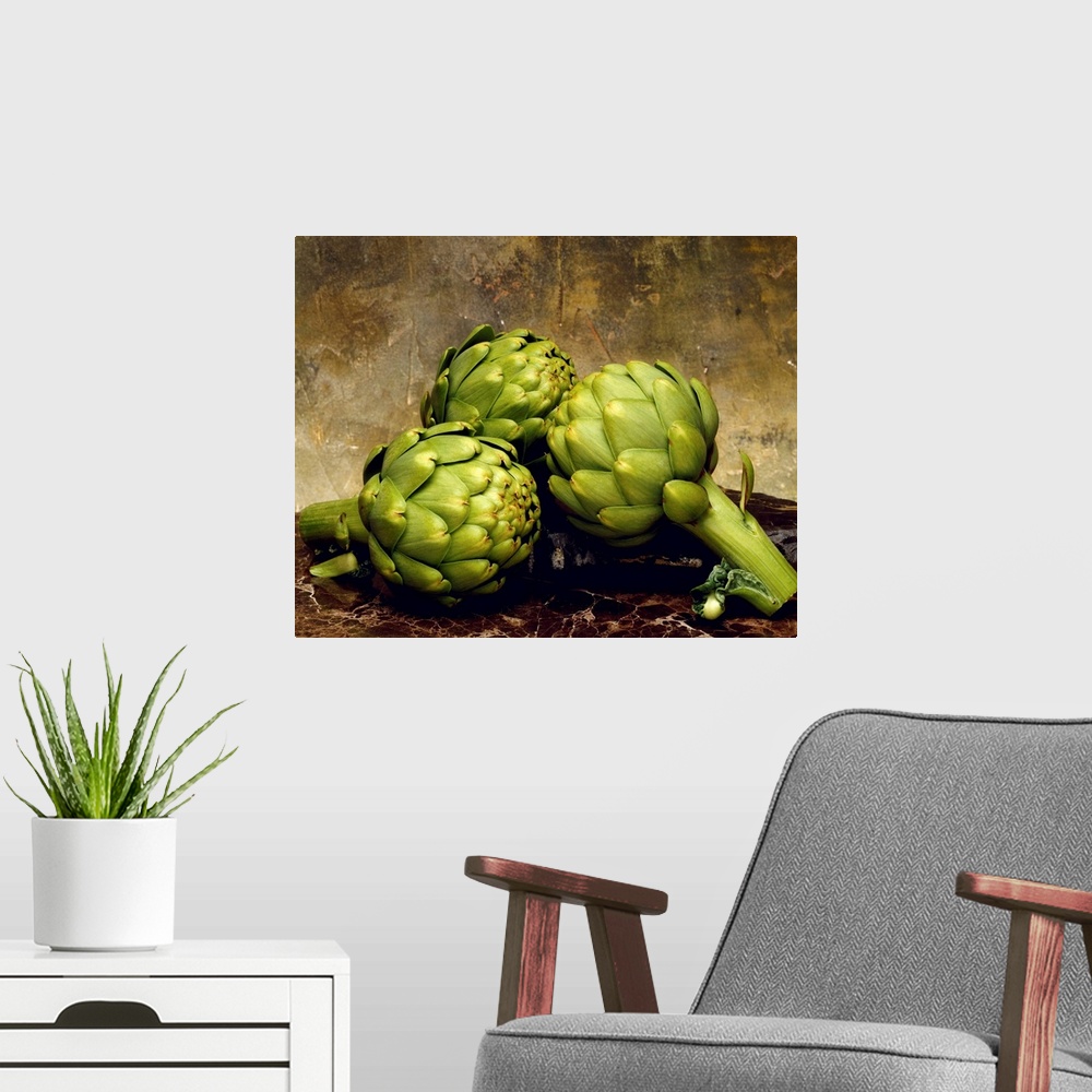 A modern room featuring Three artichokes on marble