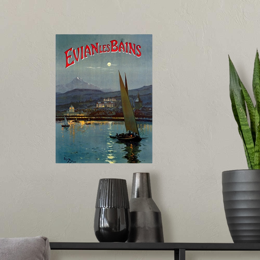 A modern room featuring Big, vertical vintage travel advertisement for Evian les Bains of several sailboats in the moonli...