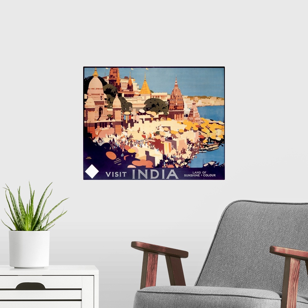 A modern room featuring Travel advertisement for India, the Land of Sunshine and Color, featuring the city of Varanasi.
